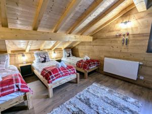 Maisons de vacances Chalet grand confort avec sauna et balneo - Proche stations de ski - FR-1-589-762 : photos des chambres