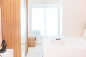 Comfort Living Studio Room at Grand Kamala Lagoon Apartment By Travelio