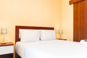 Comfort Living Studio Apartment at Grand Kamala Lagoon near Shopping Center By Travelio