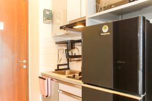 Comfort Living Studio Apartment at Grand Kamala Lagoon near Shopping Center By Travelio