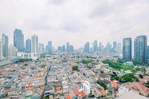 Comfort and Modern Look Studio Apartment at Ambassade Kuningan By Travelio