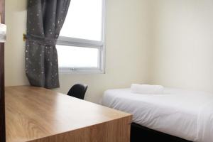 Comfortable 2BR Apartment at Mustika Golf Residence By Travelio