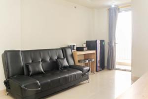 Comfortable 2BR Apartment at Mustika Golf Residence By Travelio