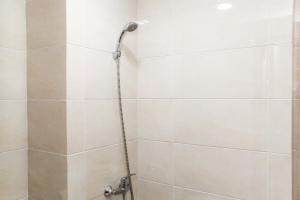 Nice and Comfort Studio Apartment at Mustika Golf Residence By Travelio