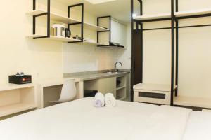 Nice and Comfort Studio Apartment at Mustika Golf Residence By Travelio