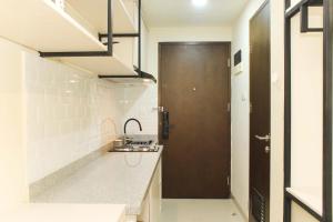 Nice and Comfort Studio Apartment at Mustika Golf Residence By Travelio