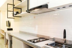 Nice and Comfort Studio Apartment at Mustika Golf Residence By Travelio