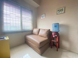 Cozy 2BR at Pinewood Apartment By Travelio