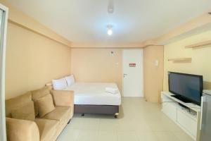 Cozy Studio at 30th Floor Bassura City Apartment By Travelio