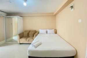 Cozy Studio at 30th Floor Bassura City Apartment By Travelio