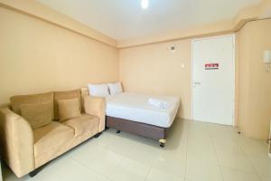 Cozy Studio at 30th Floor Bassura City Apartment By Travelio
