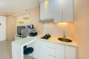 Cozy Studio at 30th Floor Bassura City Apartment By Travelio