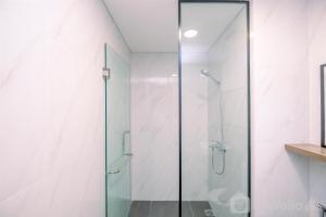 Stunning and Cozy 1BR Apartment at Ciputra World 2 By Travelio