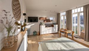 MAINTERRASSE Boardinghouse am Fluss klimatisierte Apartments mit 80qm Terrasse
