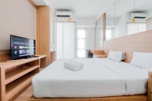 Strategic and Homey Studio Akasa Pure Living BSD Apartment By Travelio