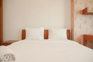 Beautiful and Homey 2BR Apartment Thamrin Residence By Travelio