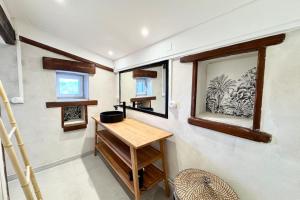 Maisons de vacances Magnifique Maison les pieds dans l-eau : photos des chambres