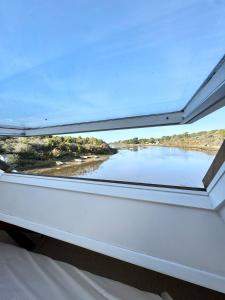 Maisons de vacances Magnifique Maison les pieds dans l-eau : photos des chambres