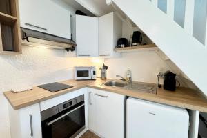 Maisons de vacances Maisonnette neuve - 700m des plages - Piscine : photos des chambres