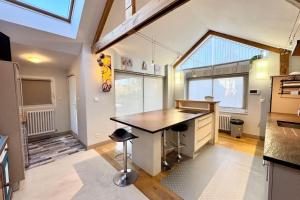 Maisons de vacances Spacieuse longere archi cosy - Jardin : photos des chambres