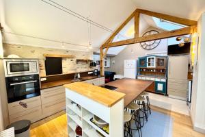 Maisons de vacances Spacieuse longere archi cosy - Jardin : photos des chambres