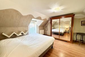 Maisons de vacances Spacieuse longere archi cosy - Jardin : photos des chambres