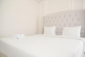 Modern Look and Warm 1BR at Gold Coast Apartment By Travelio