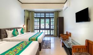 Treebo Spring Birds - Kainchi Dham