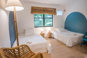 HILLSIDE Nest Townhouse in Subic Bay with Self-Serve Breakfast- Full AC, Monkeys, Pet Friendly with a Fee