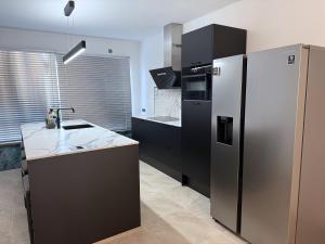 Moderne woning Drachten 2 slaapkamers dichtbij centrum parking voor de deur