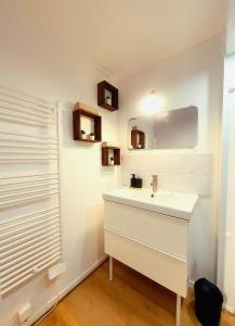 Appartements La Petite Boulonnaise Studio cosy avec cour privative - proche Nausicaa : photos des chambres