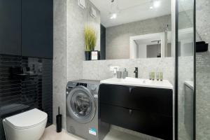 Prestiżowe Apartamenty w Poznaniu z Sypialnią i Parkingiem by Noclegi Renters