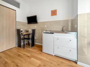 Appartements Studio lumineux avec clim et TV ideal pour couples : photos des chambres