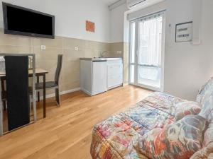 Appartements Studio lumineux avec clim et TV ideal pour couples : photos des chambres