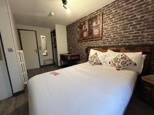 Hotels Le Richelieu Bacchus : photos des chambres