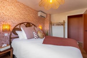 Appartements Vignes & Tropiques - Terrasse - Wifi - Clim - Parking : photos des chambres