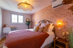 Appartements Vignes & Tropiques - Terrasse - Wifi - Clim - Parking : photos des chambres