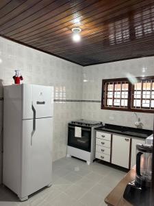 Casa Suíça - Linda e confortável casa com área gourmet