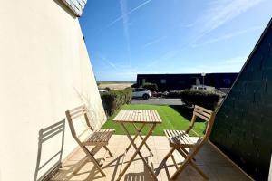 Appartements Studio Cosy neuf Vue Mer Jardin et Terrasse : photos des chambres