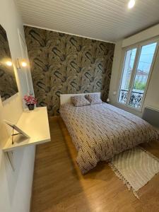 Appartements Le Nid Urbain : photos des chambres