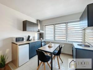 Appartements L-Atelier Zen - Confort & Cosy : photos des chambres