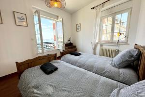 Maisons de vacances Villa authentique Vue mer 360 Les pieds dans l’eau : photos des chambres