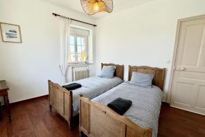 Maisons de vacances Villa authentique Vue mer 360 Les pieds dans l’eau : photos des chambres