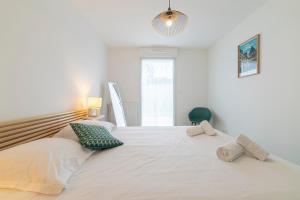 Appartements Canon proche de la gare maritime au rdc : photos des chambres