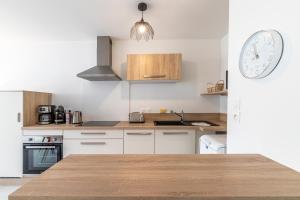 Appartements Canon proche de la gare maritime au rdc : photos des chambres