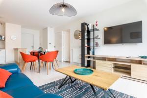 Appartements Canon proche de la gare maritime au rdc : photos des chambres