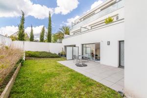 Appartements Canon proche de la gare maritime au rdc : photos des chambres