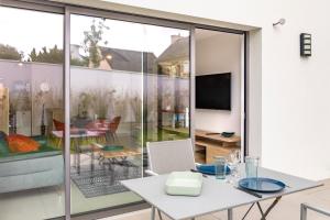 Appartements Canon proche de la gare maritime au rdc : photos des chambres