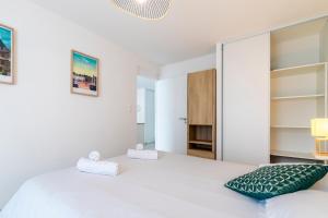 Appartements Canon proche de la gare maritime au rdc : photos des chambres