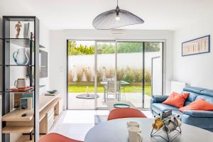 Appartements Canon proche de la gare maritime au rdc : photos des chambres